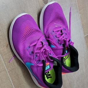 Purple Nike women's 8.5 purple sneakers paint mark